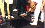 CHUCK-HOLE PATCHING MATERIAL - Ideal for repairing small holes and broken areas in black-top or asphalt paved areas. Comes ready to use.